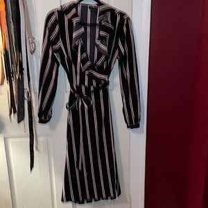 Black, white, and burgundy wrap tie dress